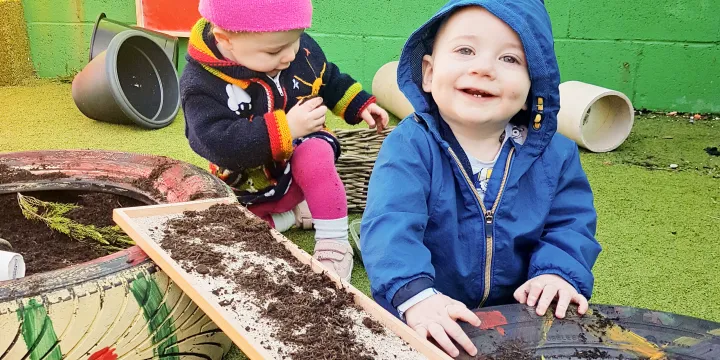 Cocoon Childcare Children Playing int he Garden