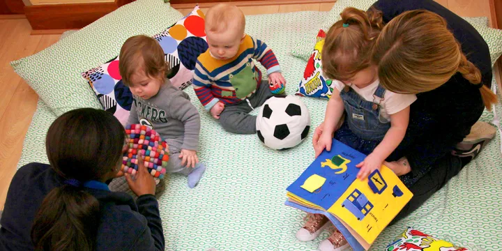 Cocoon Childcare Staff playing with children