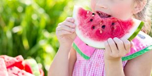 Cocoon Childcare - Girl eating watermelon