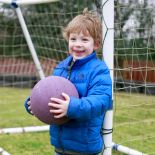 Cocoon Childcare - Boy playing football