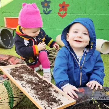 Cocoon Childcare Children Playing int he Garden